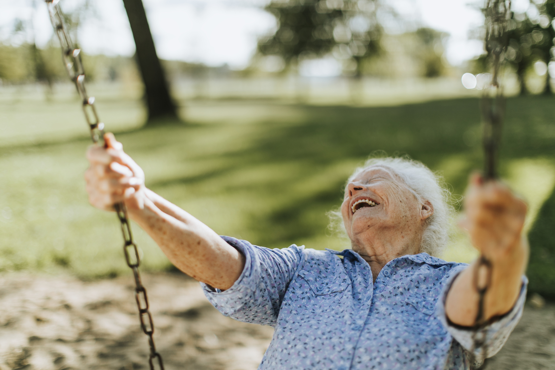 SPARK Charter Senior Woman on Swing SPARK Charter Senior Woman on Swing